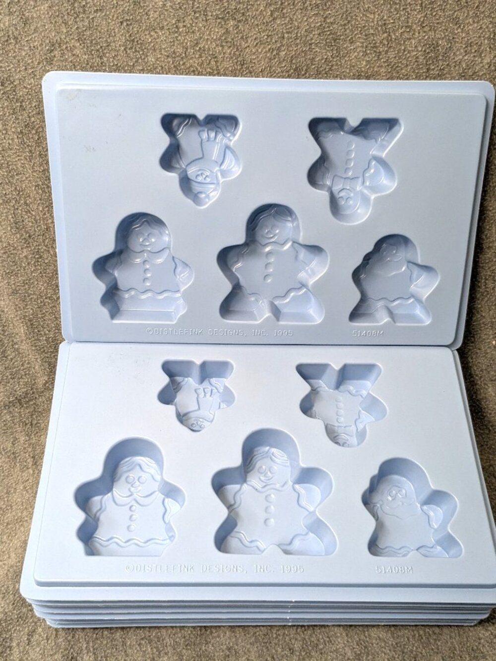 Never used: 10 Distlefink Gingerbread Men Candle Molds 1995